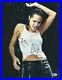 Angelina-Jolie-Autographed-11-x-14-Standing-in-Rain-Photograph-Beckett-BAS-COA-01-hjly