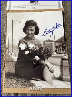 Betty White Signed Portrait At 1968 Tournament Of Roses Parade, With COA- 8x10