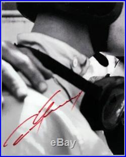 Dan Gurney, Carroll Shelby and Bob Bondurant autographed b&w photograph
