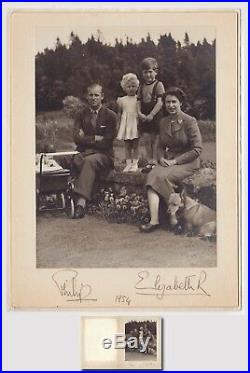 Elizabeth II, Queen and Philip, Prince Signed photograph in original folder
