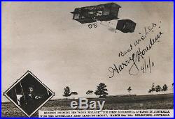 HOUDINI Piloting his Voisin Biplane AUTOGRAPHED by Houdini 1911 photo postcard