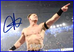JOHN CENA Signed 7x5 Photo Original Autograph (WWE Wrestling/PEACEMAKER) withCOA