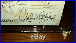 Monopoly Check signed by Charles Manson two times Dated 8/69