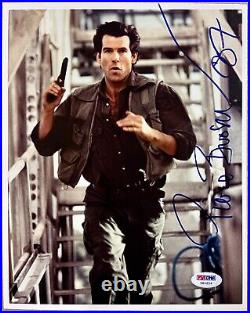 Pierce Brosnan Autographed 007 8x10 James Bond Gun Run Photo PSA DNA COA